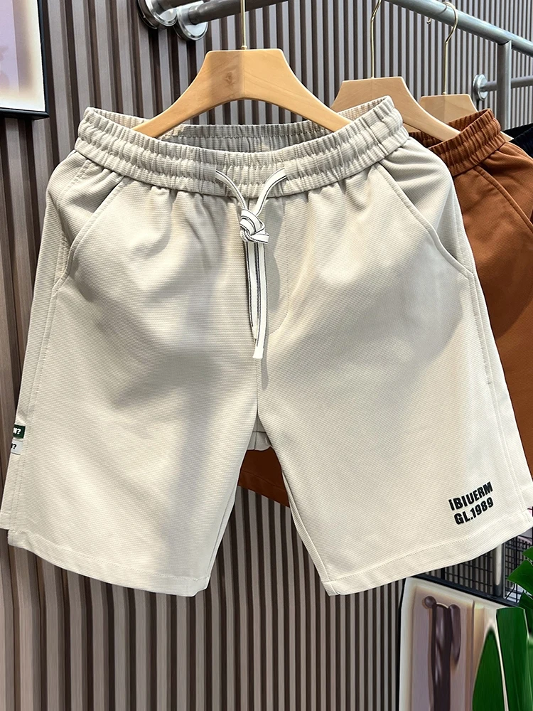 

Retro American Men's orts Summer 2026 Loose Trendy Casual Sports Pants Five-Quarter Straight Leg Youthful Energy Sle