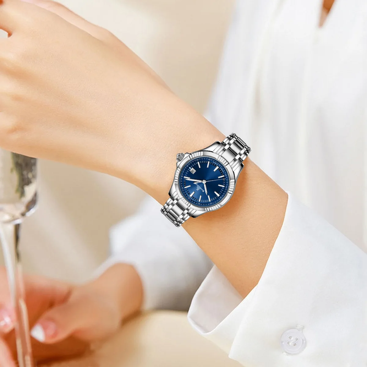 ساعة يد ميكانيكية أوتوماتيكية للزوجين من BAOFEILUN مصنوعة من الفولاذ المقاوم للصدأ وكريستال الياقوت وعرض التاريخ 50 متر مقاومة للماء هدية فاخرة