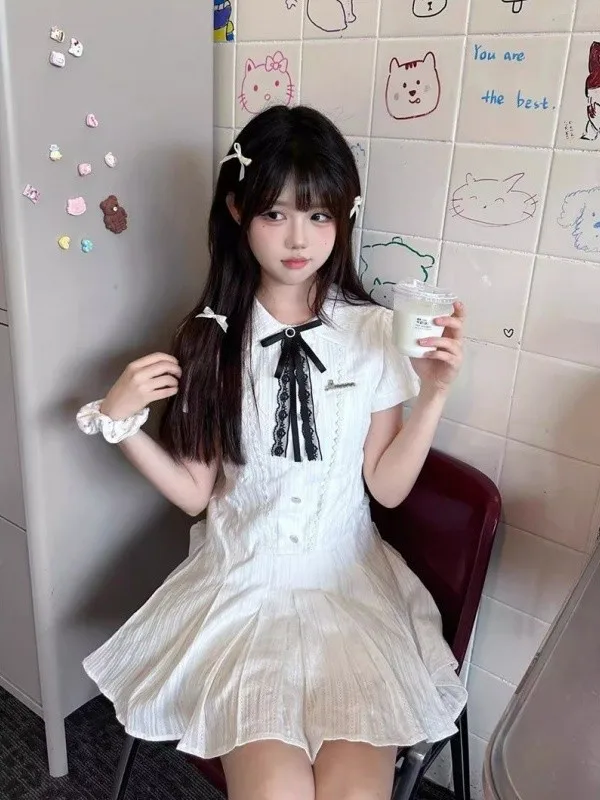 Letnia, słodka, herbaciana przerwa na herbatę, wyszczuplająca talia, kołnierzyk ort Dr, damska biała spódnica w kształcie litery A, pojedynczy element.