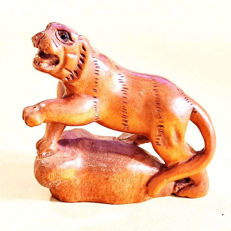 

Q4764 - 2" Hand Carved Boxwood Netsuke: Ferocious Tiger