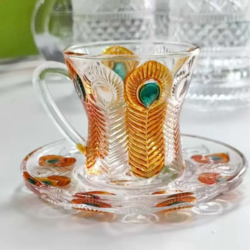 Colorful peacock-design coffee cups with matching saucers, and a cool peacock-shaped crystal glass water cup for your home