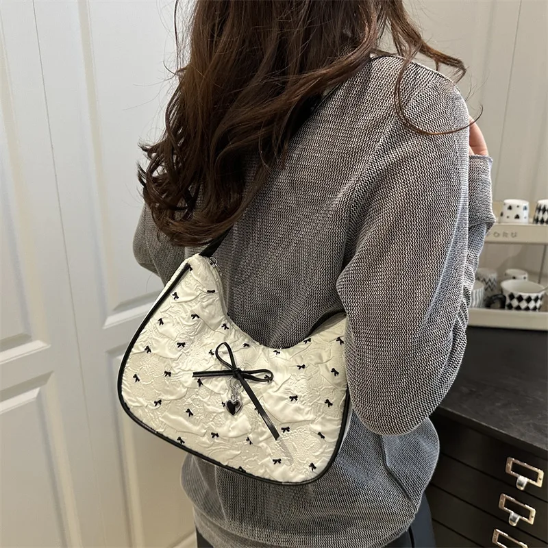 

Niche design bow underarm bag for women 2025 new style handbag fashionable shoulder cross-body sweet baguette bag