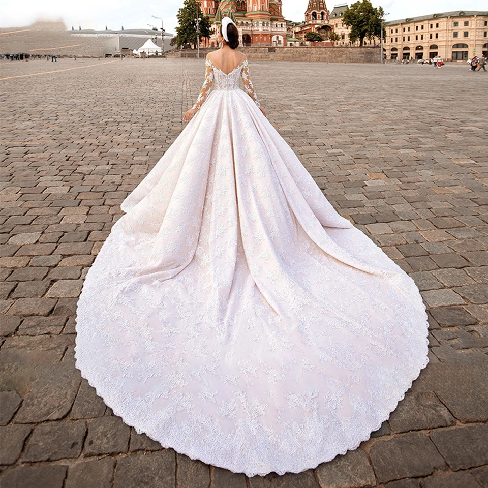 2025 Abiti da sposa bianchi a maniche lunghe per le donne Appliques Abito da festa formale senza schienale Elegante strascico di corte Abiti da sposa