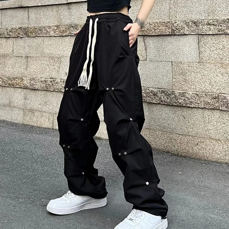 

2023 New fashion American high street wind overalls design sense pleated braided rope loose straight casual pants women