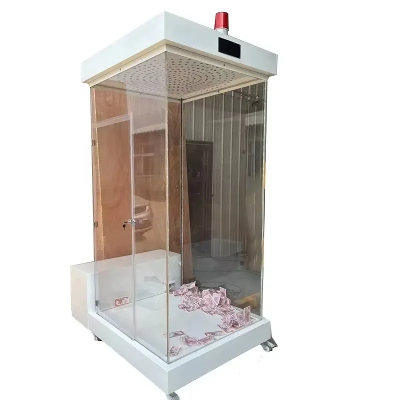 The manufacturer's new acrylic square cash grabbing machine is used as a prop for enterprise promotional warm-up activities