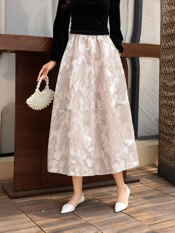 กระโปรงทรงเอพองเอวสูงลายดอกไม้สไตล์ลำลองสำหรับผู้หญิง ฤดูใบไม้ผลิ 2026 รุ่นใหม่ ดีไซน์ศิลปะ ทรงหลวม