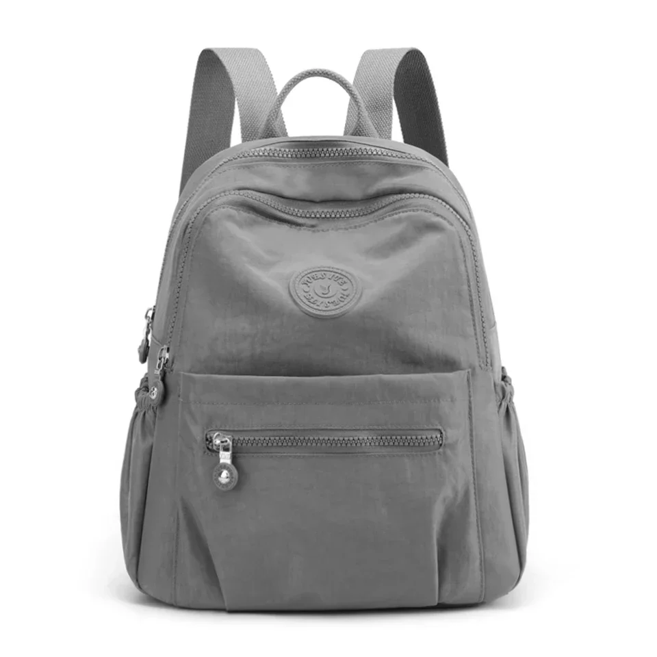 Solid Color Nylon Backpack Lightweight Travel School Bag Fashion Daypack For Work Travel Bag Can Be Hung In Luggage