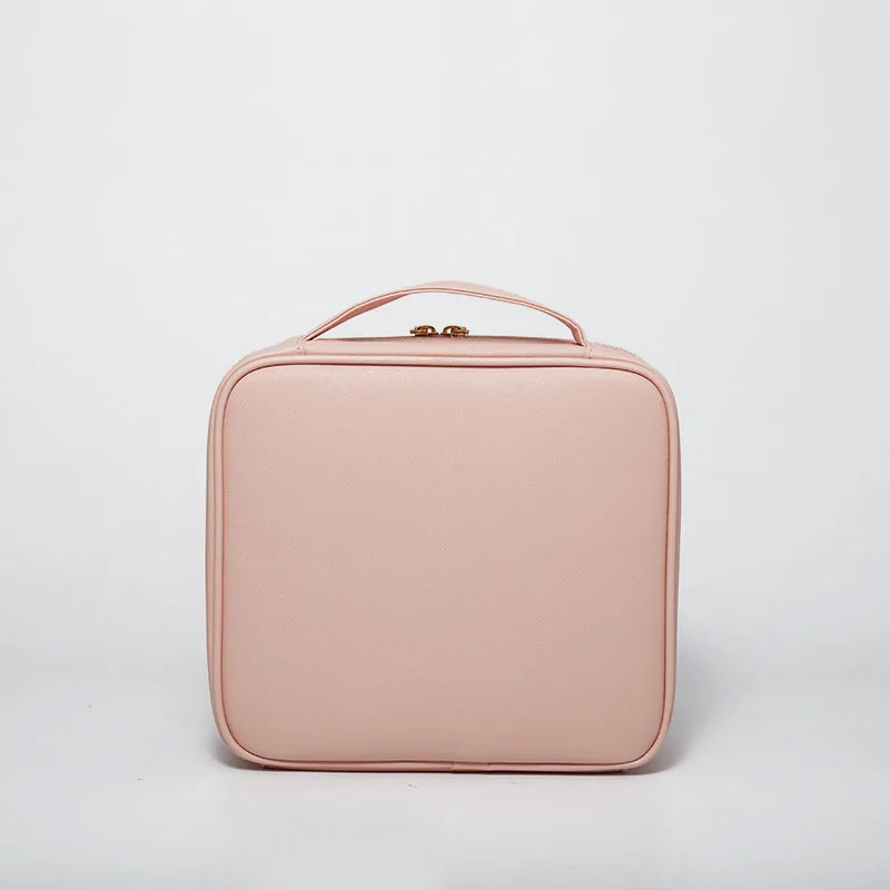 Makeup artist's portable makeup bag for on-the-go makeup application, including compartments for tools, suitable for makeup,
