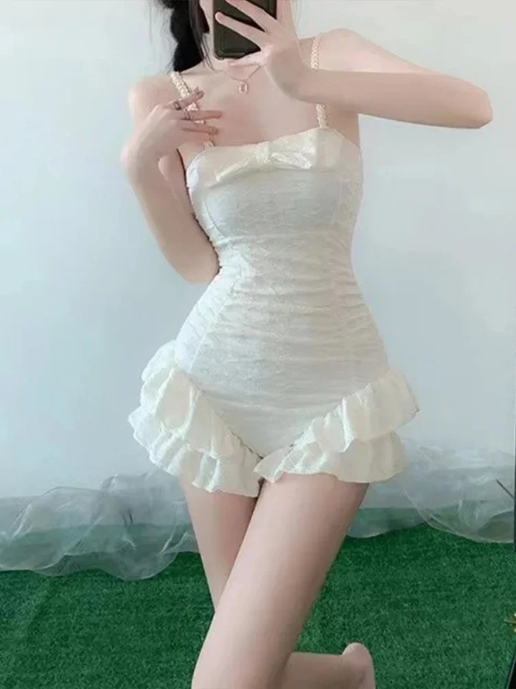 2025 nuevo traje de baño de una pieza de playa de verano Sexy volantes sólido Spaghetti Strap Vestido de playa mujeres de cintura alta Slim estilo de playa Bikini