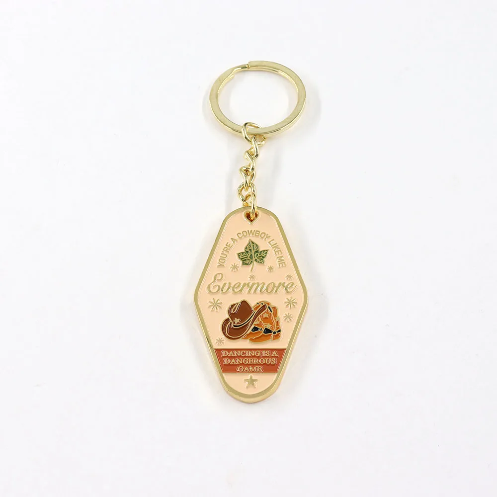 

Evermore Gold Rush metal keychain Cowboy Like Me dancing is a dangerous game music fans lover gift souvenir key ring