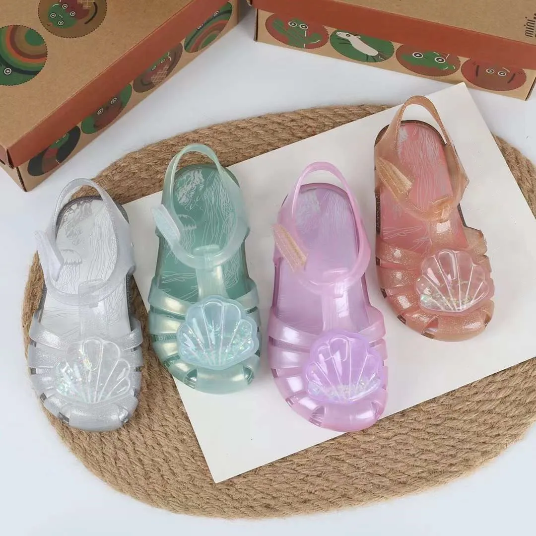 

2024 Hot New Children's Shell Sandals Fashion Baby Girls Glitter Pearl Jelly Beach Shoes Kids Candy Color Jelly Shoes HMI093