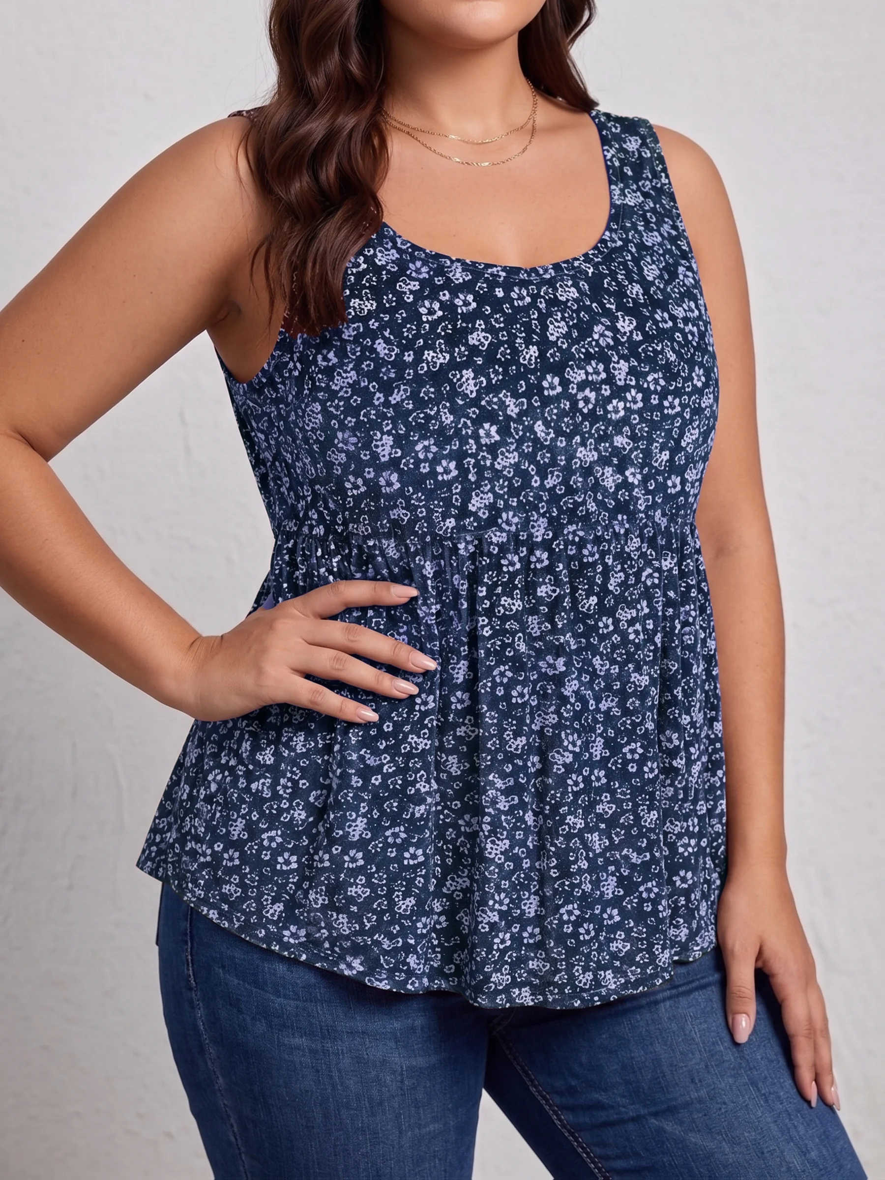Plus Size Women's Sleeveless Floral Print Top with Flared Hem Ideal for Summer Style