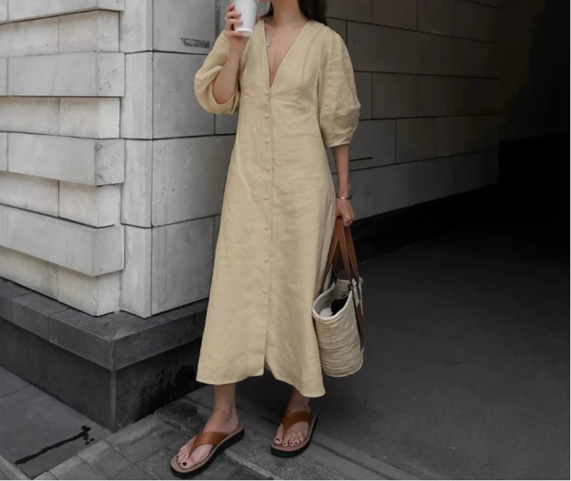 2025 Franse stijl licht volwassen beige linnen bubble mouw jurk dames zomer backless losse v-hals shirtjurk lange jurk