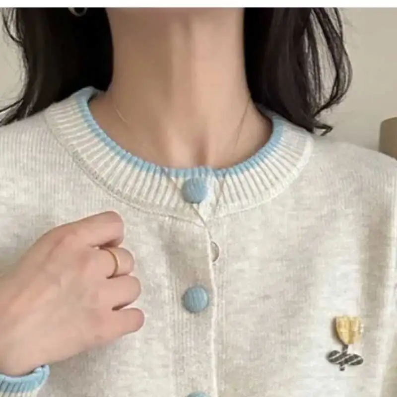 女性服秋冬ファッションシンプルボタン無地ニット女性オールマッチファッショナブルなルーズセーターカーディガン