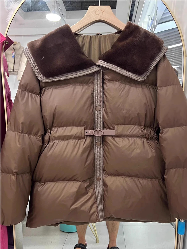 Cappotto ispessito slim-fit con cintura di media lunghezza di alta qualità 2025 da donna Nuovo inverno elegante piumino d'anatra bianco di nuova moda