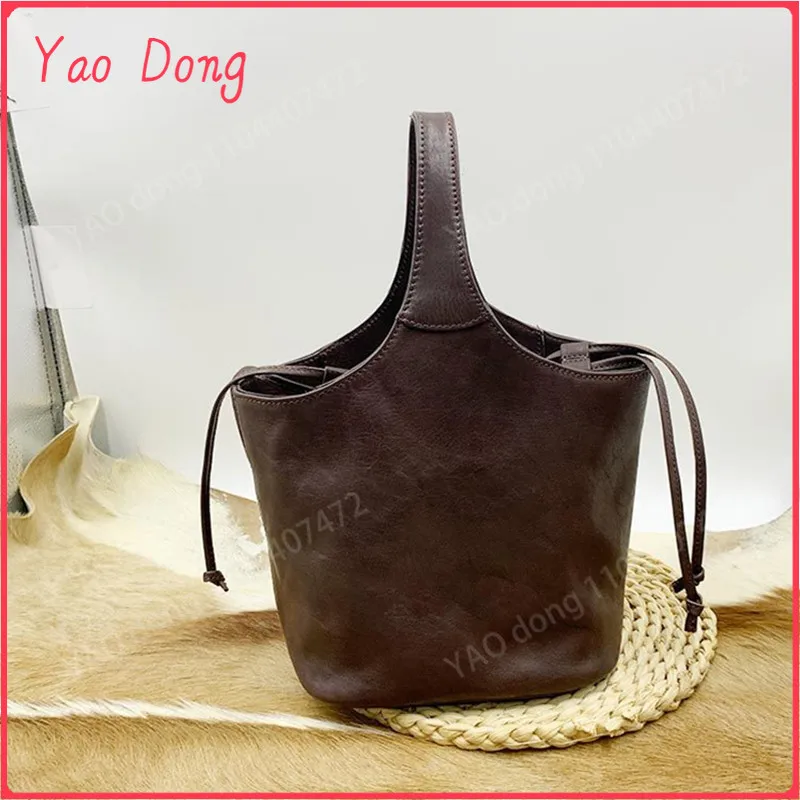 Yao Dong The first layer of vintage cowhide flower basket package plant tanned large capacity vegetable basket bucket bag female