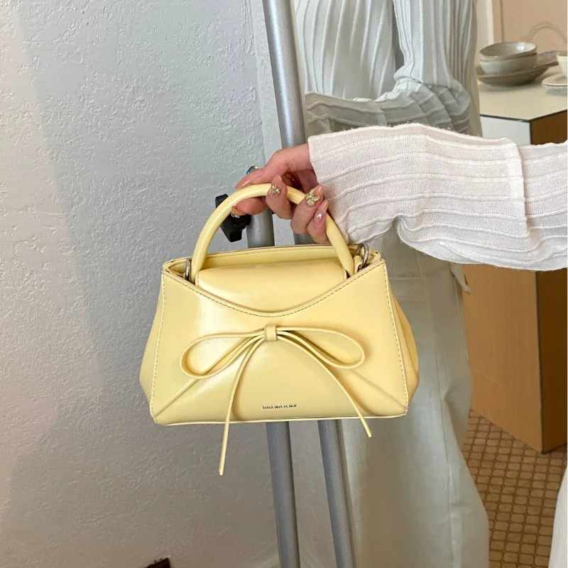 

Korean Spliced Armpit Tote Bag for Women 2026 Simple Gentle Sweet Bow Female Shoulder Bag Fashionable Versatile Crossbody Bag
