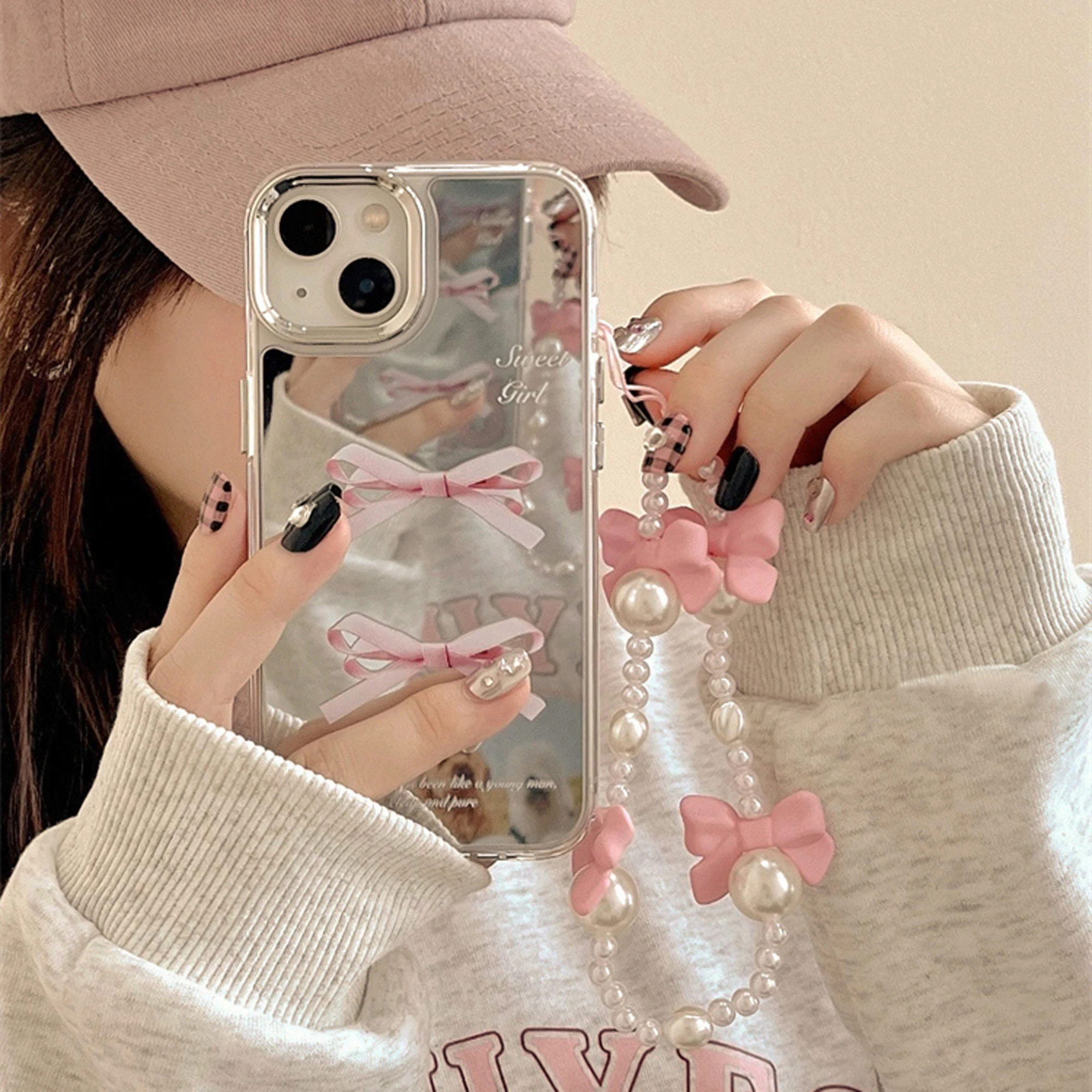 Two pink bow mirror phone cases for iPhone 15 14 13 12 11 drop resistant mirror phone cases with bow chain