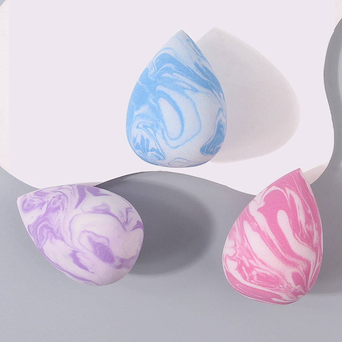 ระดับรูปลักษณ์สูง ไข่แต่งหน้าพื้นผิวหินอ่อน 3 ฟอง รองพื้นอเนกประสงค์แบบแห้งและเปียก คอนซีลเลอร์ และพัฟแป้งแต่งหน้า