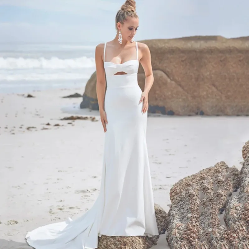 Abiti da sposa a sirena bianca da spiaggia cinturino per Spaghetti senza maniche abito da sposa senza spalline Sexy senza schienale con bottone Robe De Mariee