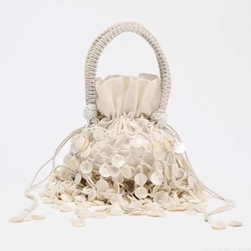

Women's Beach Woven Handbag Handmade Shell Fishing Net Weaving Shoulder Bag for Travel Vacation Ladies Clutches