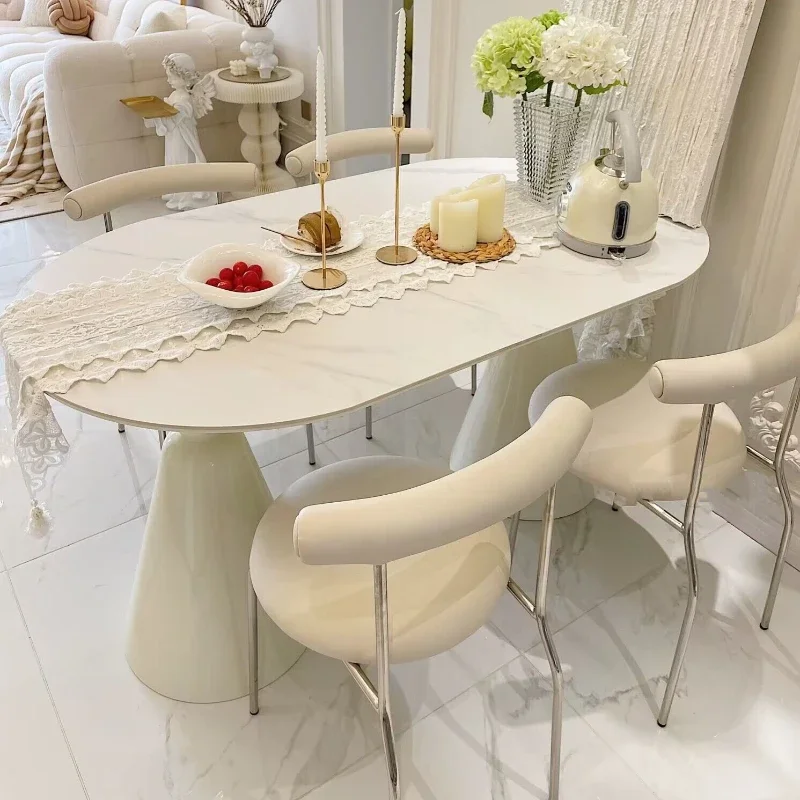 

Cream wind rock slab dining table and chairs, small apartment, modern simple light luxury, solid wood dining table, household