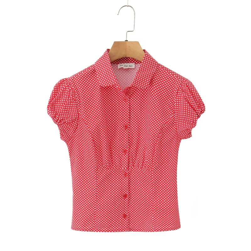 

Ретро-комплект: юбка в горошек с пышными рукавами и кружевной отделкой, плиссированная короткая юбка и топ. Женская мода Весна 2024