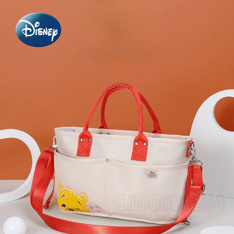 Disney-Bolsa de pañales Original para bebé, bolso de mano de dibujos animados Winnie The Pooh, gran capacidad, multifuncional, impermeable