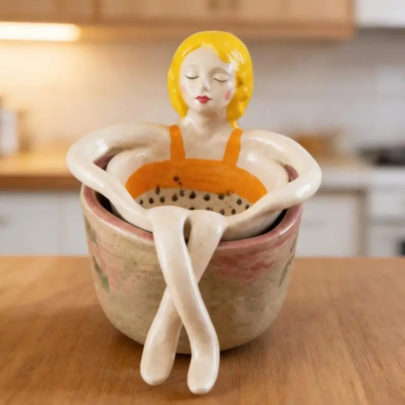 Tea Strainer with Seated Woman Figure, Perforated Bowl and Extended Limbs for Positioning Across Cups During Tea Y5GB