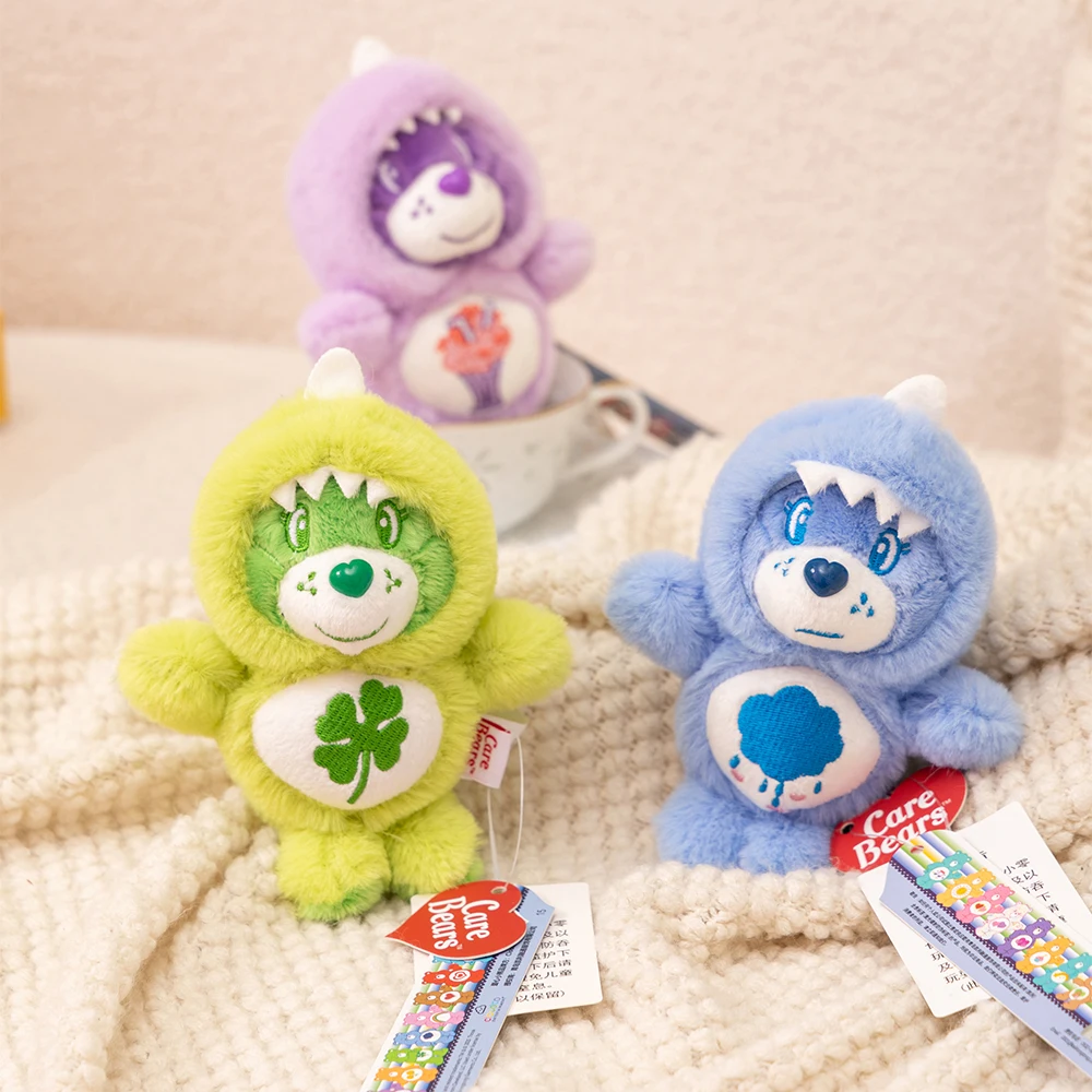 15 ซม.Care หมีไดโนเสาร์จี้ตุ๊กตากระเป๋าเป้สะพายหลังกระเป๋าตุ๊กตาพวงกุญแจน่ารักโทรศัพท์ตุ๊กตาหมีพวงกุญแจ