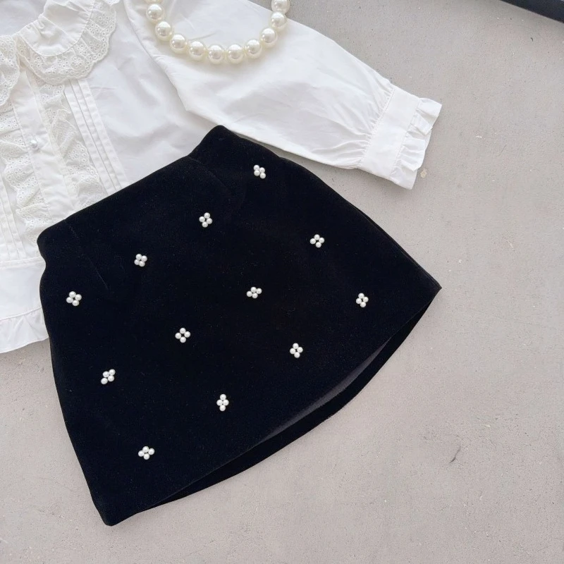 

Детская черная юбка для девочек, весна-осень, новая коллекция, корейский стиль, из жемчужного бархата, простая и элегантная, для детской одежды