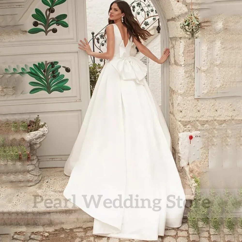 Simple V-Neck Sleeveless Wedding Dress A-Line Satin Floor Length Bridal with Belt and Large Bow Formal Marriage Custom Gowns