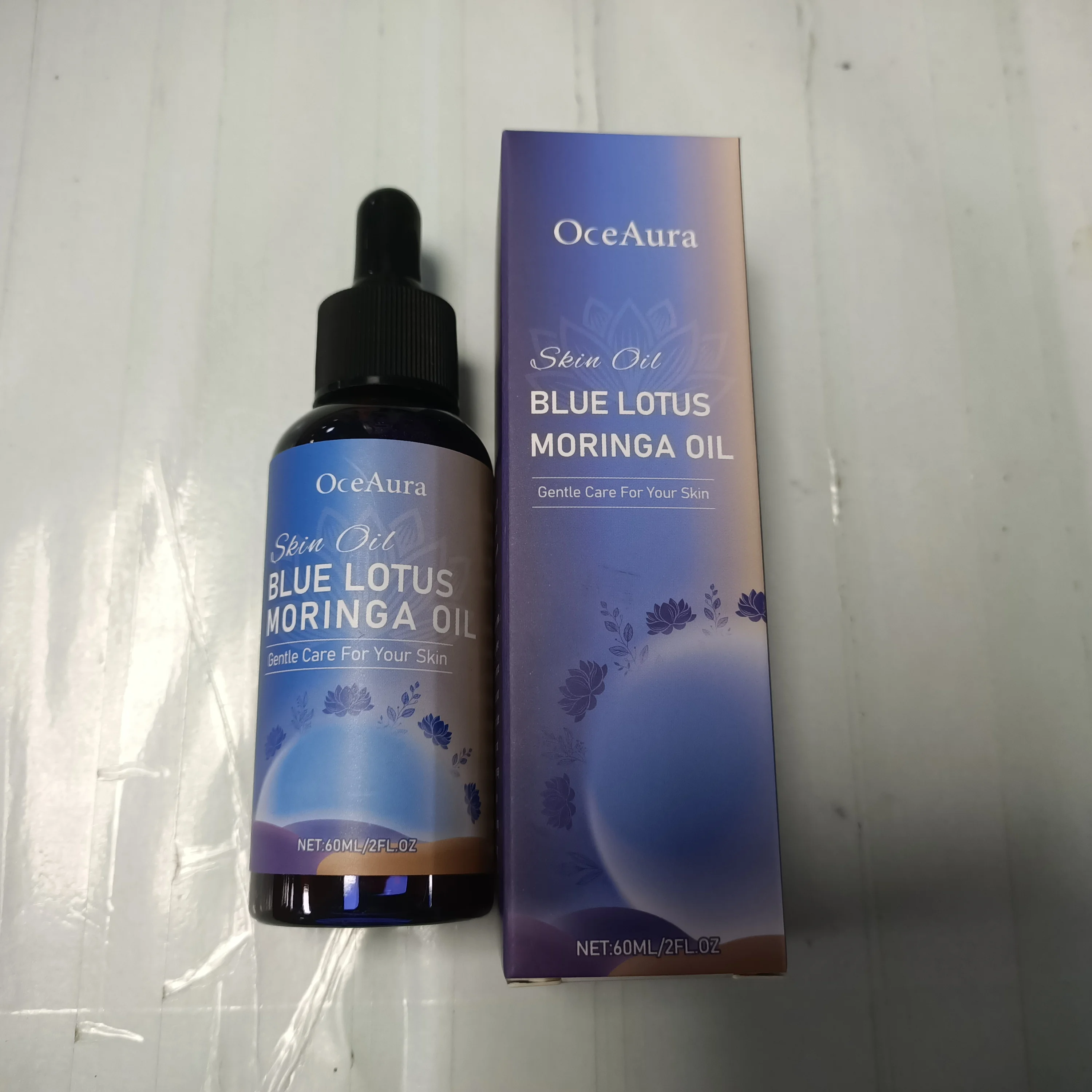 زيت البشرة OceAura Blue Lotus & Moringa - زيت مغذي للوجه والجسم للعناية بالبشرة اللطيفة - 60 مل