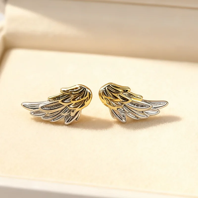 New Personality Wings 925 Sterling Silver Jewelry Fashion Versatile Three-dimensional Texture Earrings E174