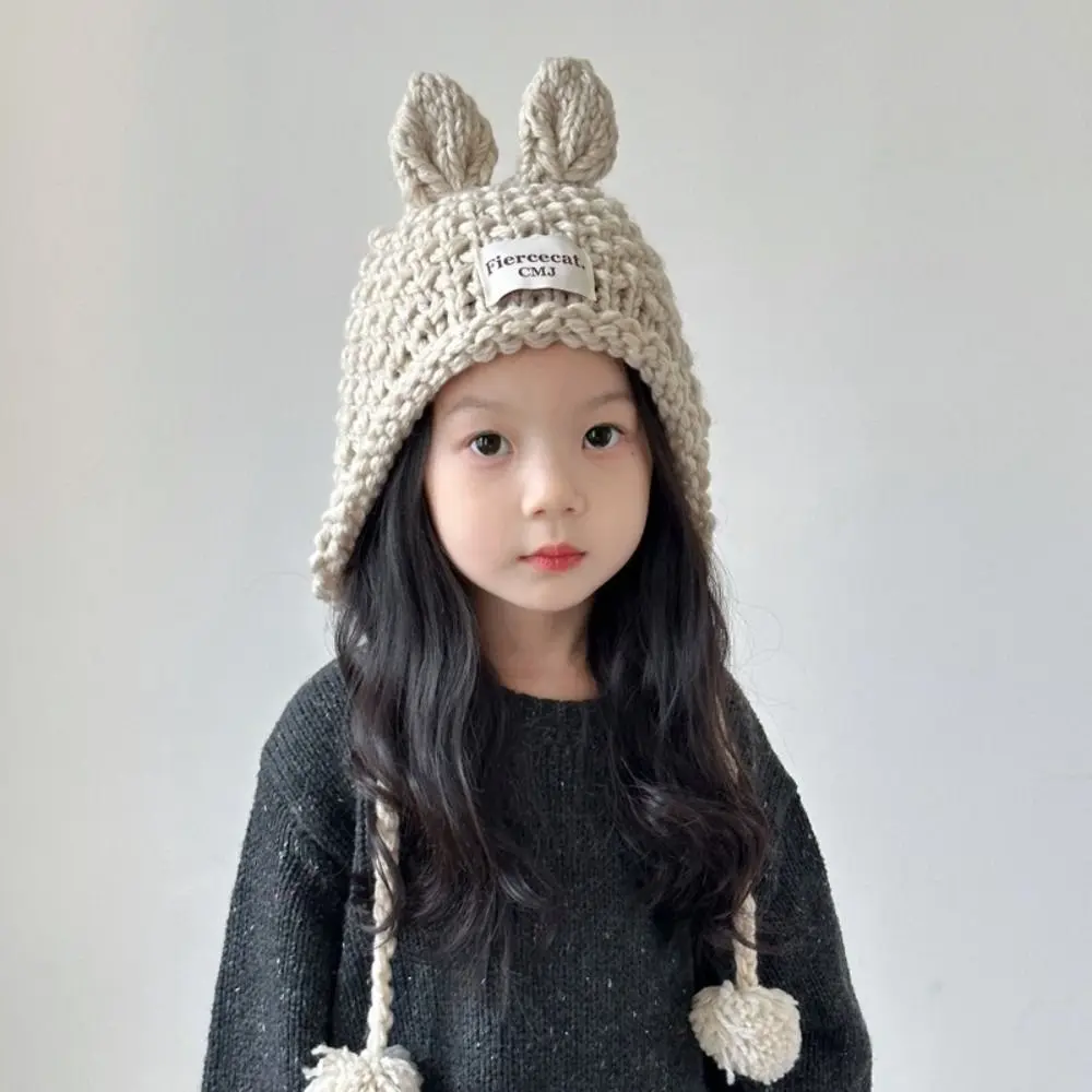 

Cute Solid Color Baby Crochet Hat Soft Warm Autumn Winter Hand Knitted Cap Outdoor Rabbit Ear Ear Protection Cap