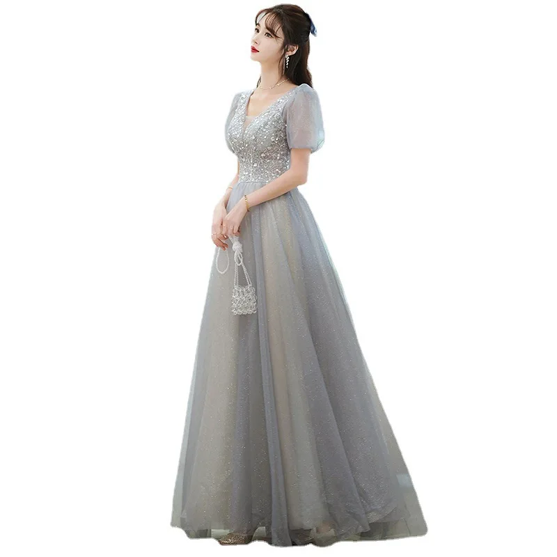 ชุดราตรีคอวีลึกสําหรับผู้หญิงฤดูร้อน 2025 ใหม่Elegant Princessชุดยาวอารมณ์โฮสต์การประชุมประจําปีชุด