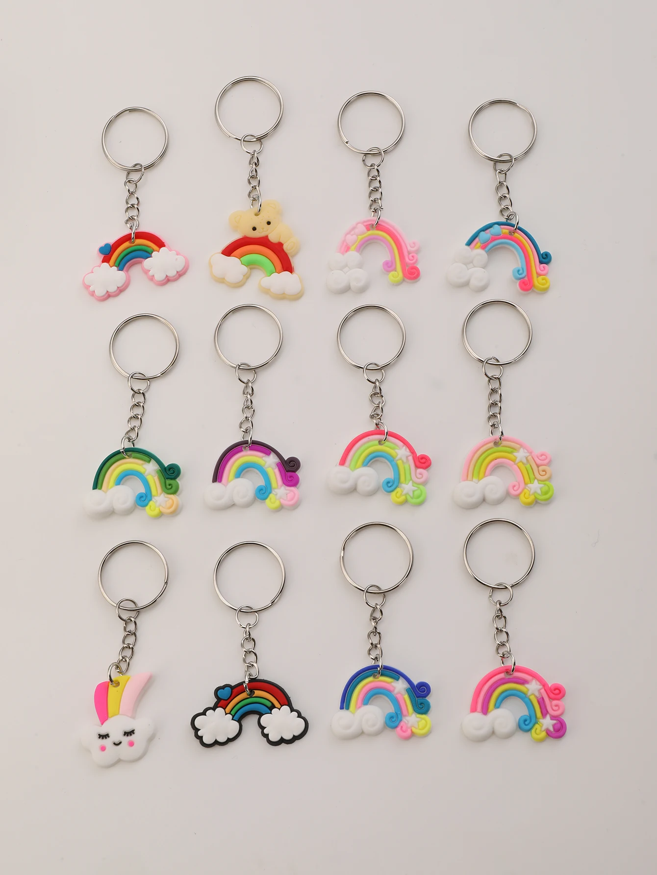 سلسلة مفاتيح كرتونية بألوان قوس قزح من السيليكون PVC ، سلسلة مفاتيح سحابية ، حقيبة محفظة ، سحر حقيبة ظهر ، مستلزمات حفلات أعياد الميلاد ، 12 *