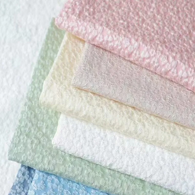 

ZYFMPTEX Solid Color Small Floral Simple Relief Three-dimensional Micro Elastic Bubble Jacquard Fabric 150x50cm DIY Dress Fabric