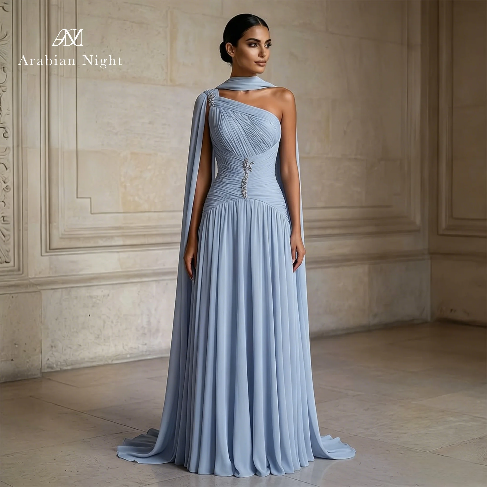 Blue one-shoulder strapless sleeveless maxi dress formal occasion prom gown featuring draping and metallic embellishment