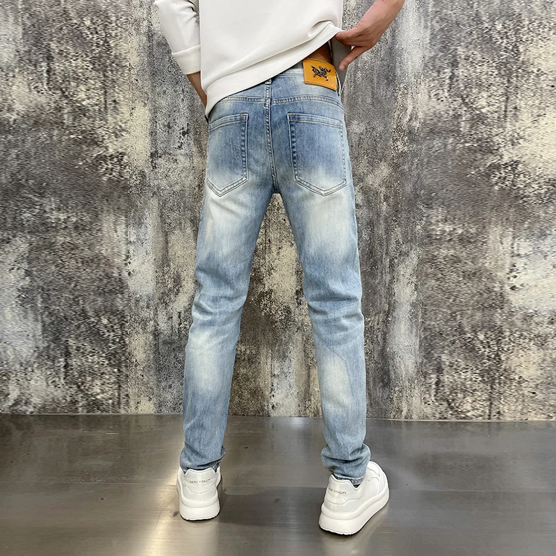 High-end Korean version of the light luxury men\'s jeans stretch Slim autumn and winter retro light blue men\'s models trousers me