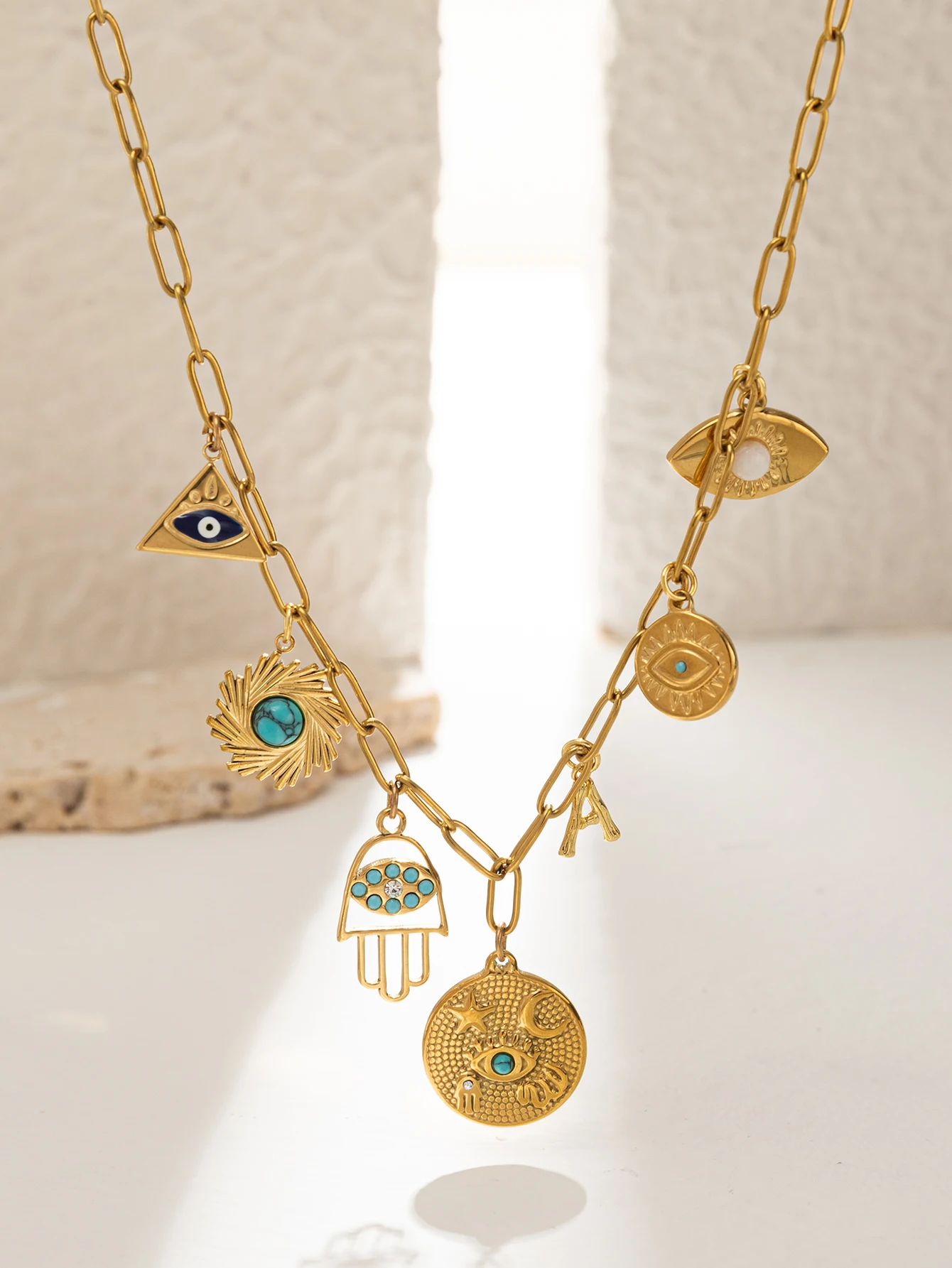 European and American hot selling 26 letter vintage series eyes and palm imitation turquoise pendant retro necklace for women