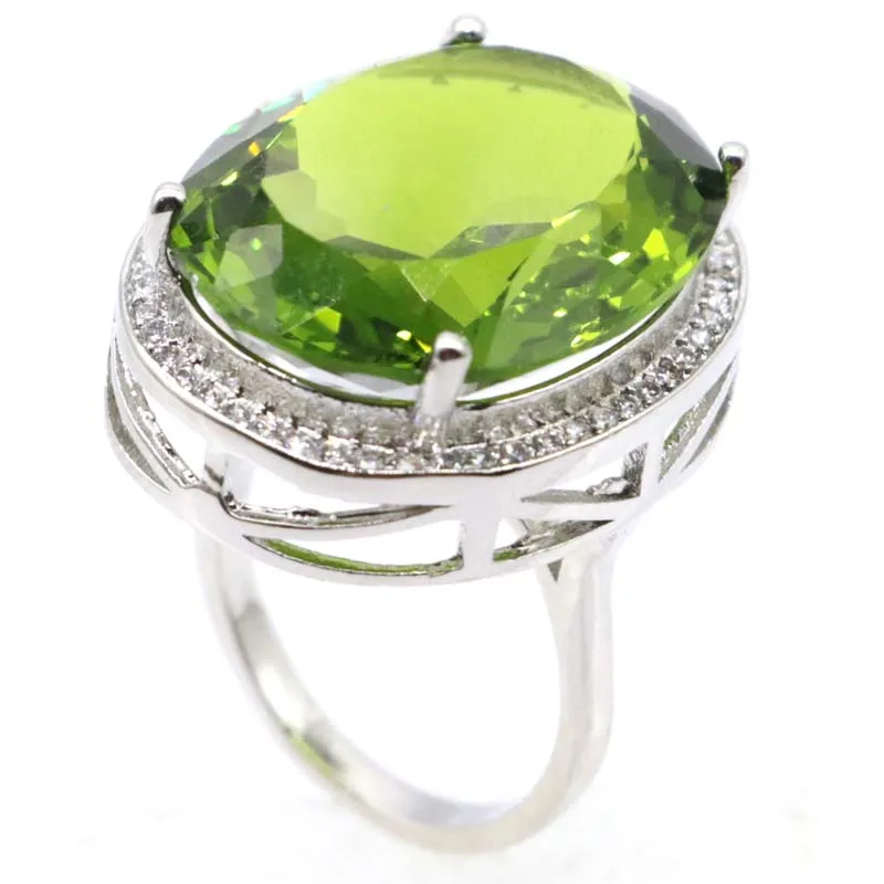 Buy 4 Get 1 Free 34x21mm Hot Selling Big Oval Delicate Fine Cut Green Peridot Cz Women Dating Silver Pendant Ring