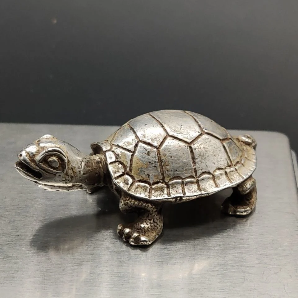 

Old objects: silver-plated turtles during Guangxu period Dynasty, silver ingots, copper silver ingots, and old silver turtles