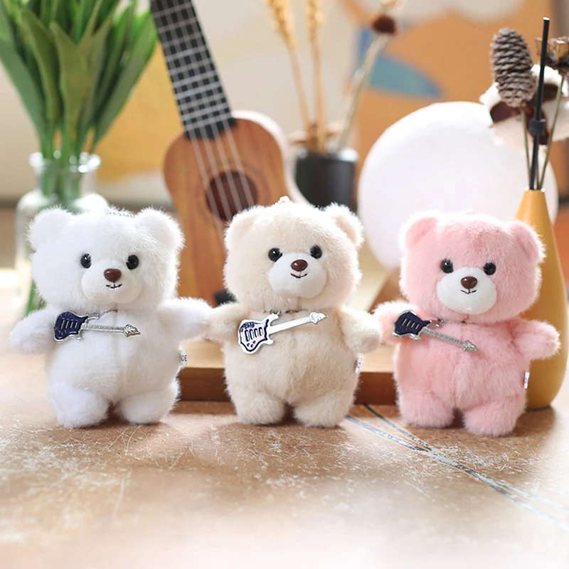 Poupée en peluche avec pendentif ours en peluche de guitare douce - Porte-clés en peluche mignon pour sac à dos - Cadeau d'anniversaire idéal pour enfant.