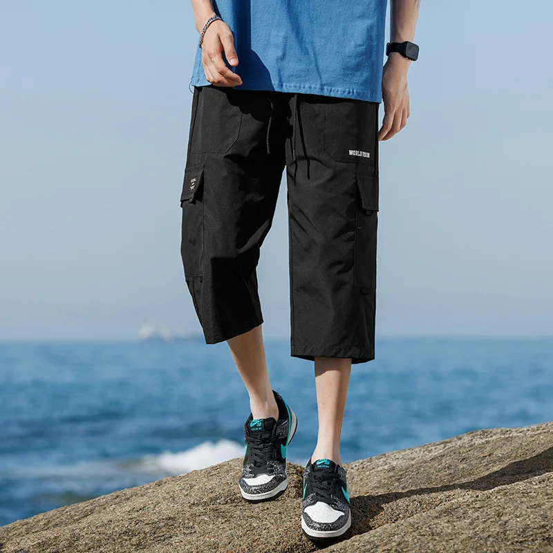 السراويل الرياضية 3/4 السراويل رجل الصيف حجم كبير الرجال الصيف اقتصاص السراويل الرجال ملابس خارجية سوداء فضفاضة العصرية رقيقة نمط الرجال الذكور