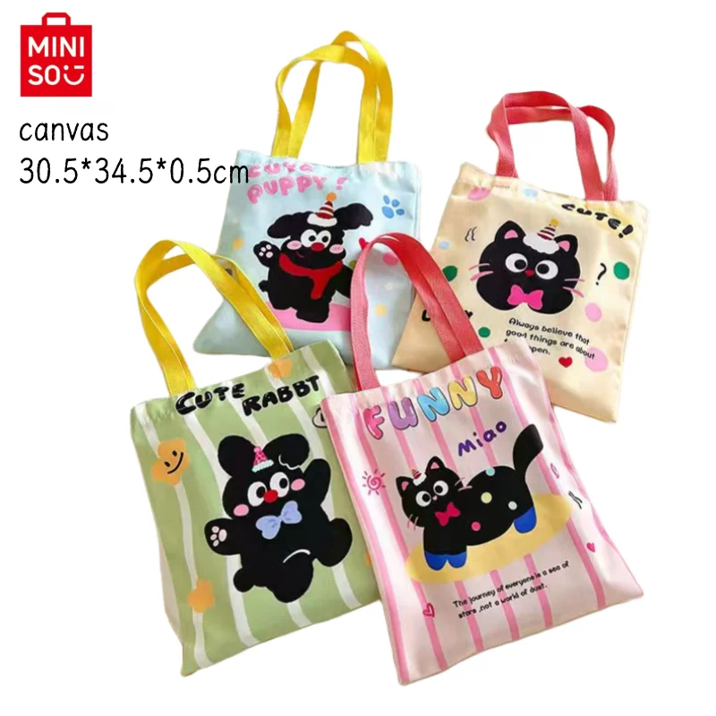 Miniso new Instagram style tutoring bag cute polka dot cat student canvas girl heart tutoring bag simple hand-held shoulder bag