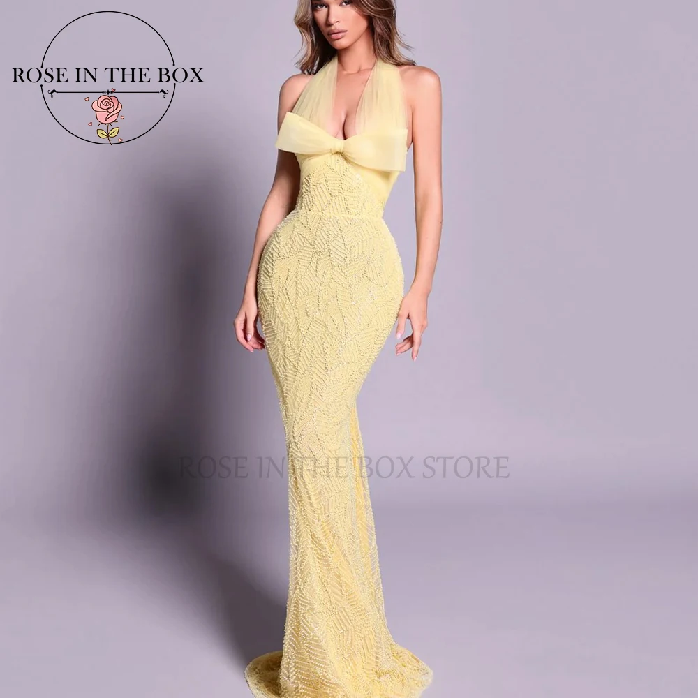 

ROSEINTHEBOX Customized Gorgeous Beaded Yellow Halter Evening Dresses 2025 with Bow Long Mermaid vestidos de fiesta elegantes
