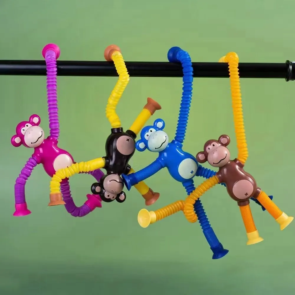 Variety of telescopic tube toys fun novelty puzzle decompression stretch tube with lamp monkey.Holiday gifts,holiday decorations