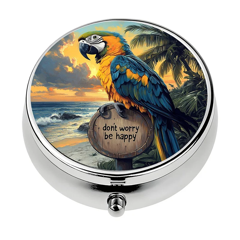 A compact travel pill organizer with a tropical parrot design, featuring three compartments for storing medication. It's small enough to fit in your pocket or purse, making it an excellent and unique gift