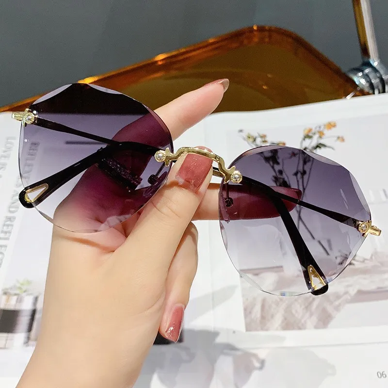 New Fashion Sunglasses for Women Ocean Lens Polygon Street Shot to Make Big Face Thin-Looked Frameless Trimming